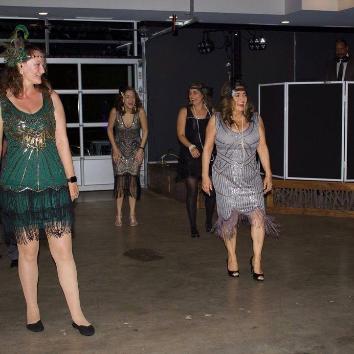 Guests dancing at a 1920s Gatsby-themed party
