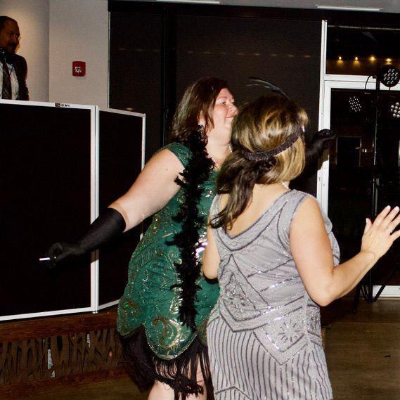 Ferrell at the DJ booth during a Gatsby-themed party
